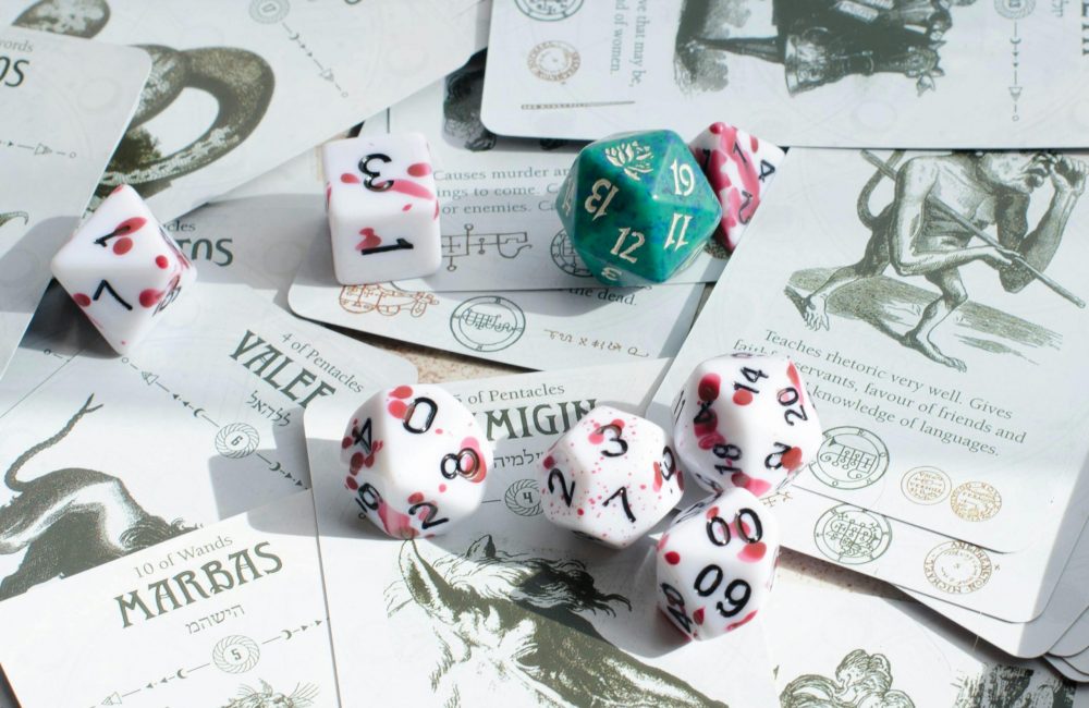 Tarot cards and gaming dice scattered, a blend of mysticism and tabletop gaming.